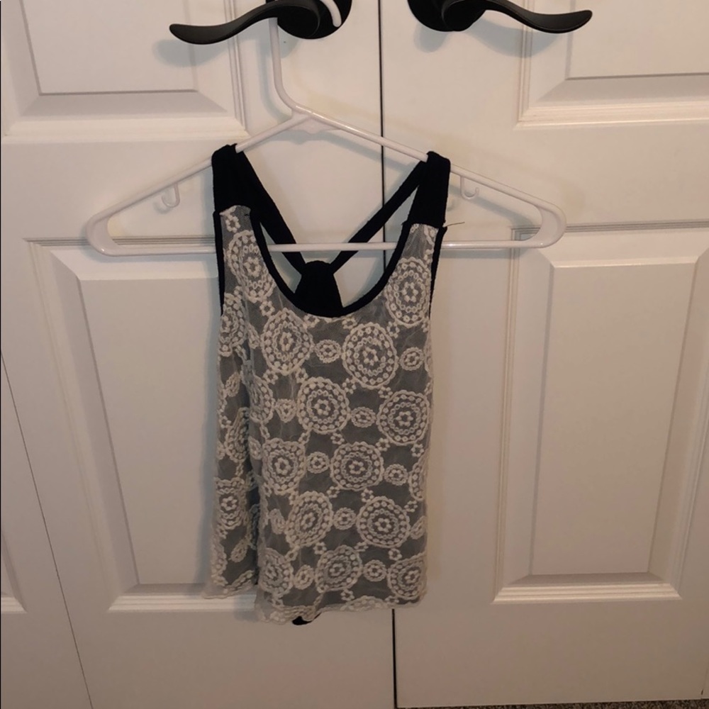 white lace over navy blue tank